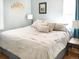 Cozy bedroom with natural light, light blue walls, and cloud decor at 5618 Carr St, Arvada, CO 80002