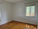 Bedroom with hardwood floors and a window at 5618 Carr St, Arvada, CO 80002