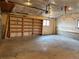 Large garage features ample shelving for organization and storage solutions at 5618 Carr St, Arvada, CO 80002