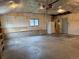 Spacious garage with shelving and plenty of room for storage and parking at 5618 Carr St, Arvada, CO 80002