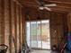 The shed features sliding glass doors and a ceiling fan for added comfort at 5618 Carr St, Arvada, CO 80002