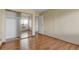 Spacious bedroom features hardwood floors, a closet, access to a bathroom, and lots of natural light at 13850 E Marina Dr # 506, Aurora, CO 80014
