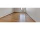 Inviting bedroom features hardwood floors, and a large window for plenty of natural light at 13850 E Marina Dr # 506, Aurora, CO 80014