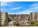 Scenic view showcasing landscaping and multiple buildings against a bright blue sky at 13850 E Marina Dr # 506, Aurora, CO 80014