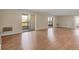 Bright living room featuring hardwood floors and access to the balcony at 13850 E Marina Dr # 506, Aurora, CO 80014