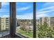 Scenic view from the window showcasing trees, sky, and buildings in the distance at 13850 E Marina Dr # 506, Aurora, CO 80014
