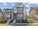 Charming two-story home with well-maintained landscaping and welcoming front entrance at 6364 Fulton St, Denver, CO 80238