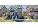 Charming two-story home with solar panels, landscaped front yard, and inviting curb appeal at 6364 Fulton St, Denver, CO 80238