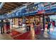 A vibrant interior view of a marketplace with diverse food vendors, retail, and dining options at 6364 Fulton St, Denver, CO 80238
