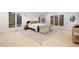 Spacious bedroom features hardwood floors, large windows, and a comfortable sitting area at 1 Greenridge Rd, Greenwood Village, CO 80111