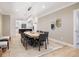 Open concept dining room featuring hardwood flooring and views of the modern kitchen at 1 Greenridge Rd, Greenwood Village, CO 80111