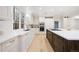 Beautiful kitchen featuring stainless steel appliances, countertops, and a large kitchen island at 1 Greenridge Rd, Greenwood Village, CO 80111