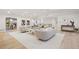 Spacious living room with neutral decor, bright lighting, and an open floor plan, great for gatherings at 1 Greenridge Rd, Greenwood Village, CO 80111