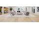 Cozy living room featuring modern furnishings, a fireplace, and seamless indoor-outdoor flow at 1 Greenridge Rd, Greenwood Village, CO 80111