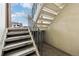 Exterior basement stairs leading to the home's entrance at 5995 W Hampden Ave # 5I, Denver, CO 80227