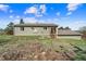 Back exterior view of home featuring a well-maintained yard at 1151 Buttercup Rd, Elizabeth, CO 80107