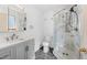 Stylish bathroom featuring a glass shower, hexagon tile floor, and modern vanity at 1151 Buttercup Rd, Elizabeth, CO 80107