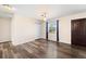 Bright bedroom with wood floors, window with view, and closet at 1151 Buttercup Rd, Elizabeth, CO 80107