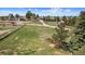 Expansive lot featuring lush greenery and mature trees, providing ample space at 1151 Buttercup Rd, Elizabeth, CO 80107