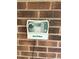 Rain Bird Irrigation Controller is wall-mounted to the brick exterior at 2093 S Holland St, Lakewood, CO 80227