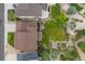 Bird's eye view of lush back yard with custom landscaping and patio spaces at 2575 Mccracken Ln, Castle Rock, CO 80104