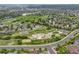 Expansive aerial view showcasing the community's lush green spaces, winding trails, playground, and well-maintained neighborhood at 2575 Mccracken Ln, Castle Rock, CO 80104