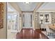 Spacious foyer with hardwood floors, natural light, and access to multiple rooms at 2575 Mccracken Ln, Castle Rock, CO 80104