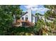 View of a home with a wooden deck, great for enjoying a barbecue at 3755 Shefield Dr, Broomfield, CO 80020