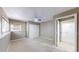 Neutral bedroom featuring carpet, a ceiling fan, and a closet, offering comfort and practicality at 3755 Shefield Dr, Broomfield, CO 80020