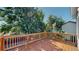 A wooden deck with surrounding trees provides ample shade at 3755 Shefield Dr, Broomfield, CO 80020