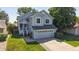 Charming two-story home with inviting front porch and well-maintained lawn at 3755 Shefield Dr, Broomfield, CO 80020