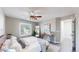 Main bedroom featuring natural light, hardwood floors, ceiling fan, and a modern design at 3755 Shefield Dr, Broomfield, CO 80020
