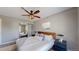 Main bedroom offering a ceiling fan, hardwood floors, and an artful interior design at 3755 Shefield Dr, Broomfield, CO 80020