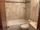 Bathroom with shower/tub combo and toilet at 20971 E 42Nd Ave, Denver, CO 80249