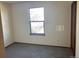 Simple bedroom with a window and carpet at 20971 E 42Nd Ave, Denver, CO 80249