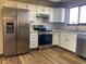 Modern kitchen featuring stainless steel appliances and light cabinets at 20971 E 42Nd Ave, Denver, CO 80249