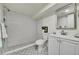 Basement bathroom with walk-in shower and updated vanity at 6749 Ingalls St, Arvada, CO 80003