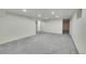 Finished basement with gray carpeting and recessed lighting at 6749 Ingalls St, Arvada, CO 80003