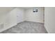 Finished basement room with gray carpet and a window at 6749 Ingalls St, Arvada, CO 80003