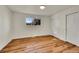 Simple bedroom with hardwood floors and ample closet space at 6749 Ingalls St, Arvada, CO 80003