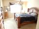 Main bedroom featuring elegant furniture, a chandelier, and soft lighting at 7354 Benton St, Arvada, CO 80003