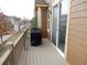 Private outdoor deck with a grill, perfect for entertaining or relaxing outdoors at 7354 Benton St, Arvada, CO 80003