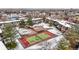 Townhome community aerial view featuring a tennis court and pool for an active and social lifestyle at 6838 S Broadway, Centennial, CO 80122