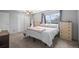 Cozy bedroom featuring natural light, closet, and dresser, creating a relaxing and inviting atmosphere at 6838 S Broadway, Centennial, CO 80122