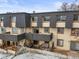 Exterior view of townhomes featuring private balconies and patios, offering cozy outdoor living spaces at 6838 S Broadway, Centennial, CO 80122