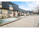 Charming townhomes offer comfortable living with well-kept exteriors and accessible walkways and lawns at 6838 S Broadway, Centennial, CO 80122