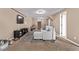 Spacious basement with a comfortable sectional, TV setup, and carpet flooring at 6062 S Newport St, Centennial, CO 80111