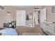 Cozy bedroom with a closet, view to the hallway, and decorations on the wall at 6062 S Newport St, Centennial, CO 80111