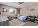 The room has been designed as a bedroom at 6062 S Newport St, Centennial, CO 80111