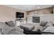 Comfortable living room with fireplace, entertainment center, and seating at 6062 S Newport St, Centennial, CO 80111